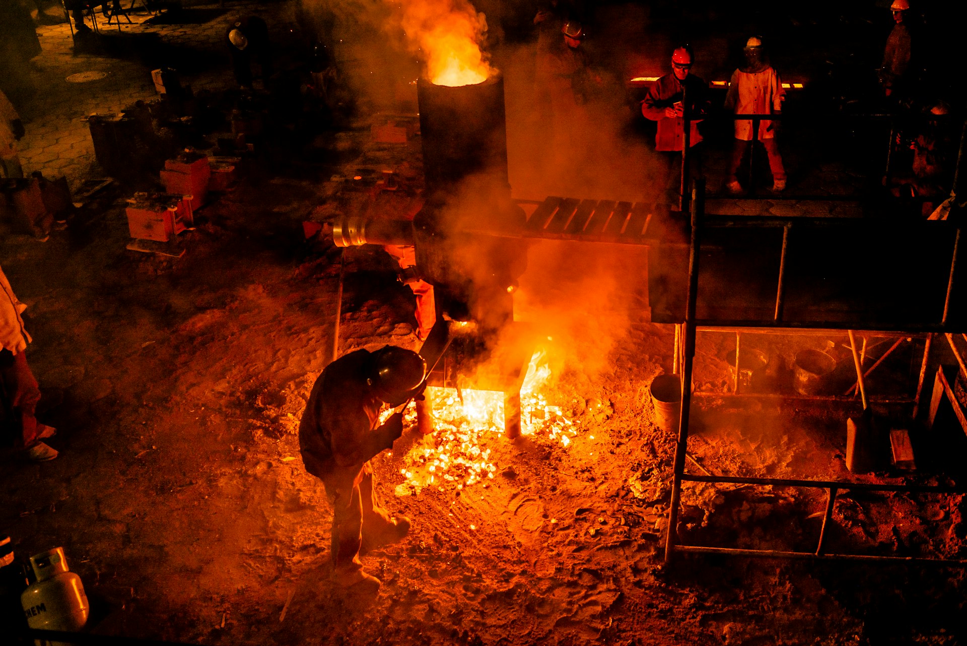 people standing near flame